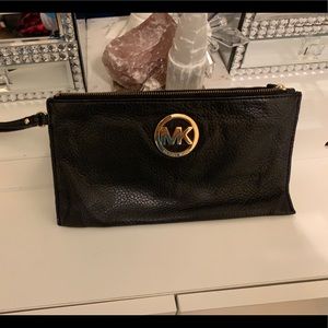 Black with gold hardware Michael kors wristlet